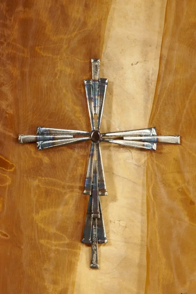 15 Nail Cross by David Broussard, rustic cut-nail cross with flame-painted center on wood.