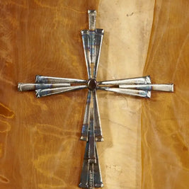 15 Nail Cross by David Broussard, rustic cut-nail cross with flame-painted center on wood.