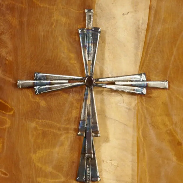15 Nail Cross by David Broussard, rustic cut-nail cross with flame-painted center on wood.